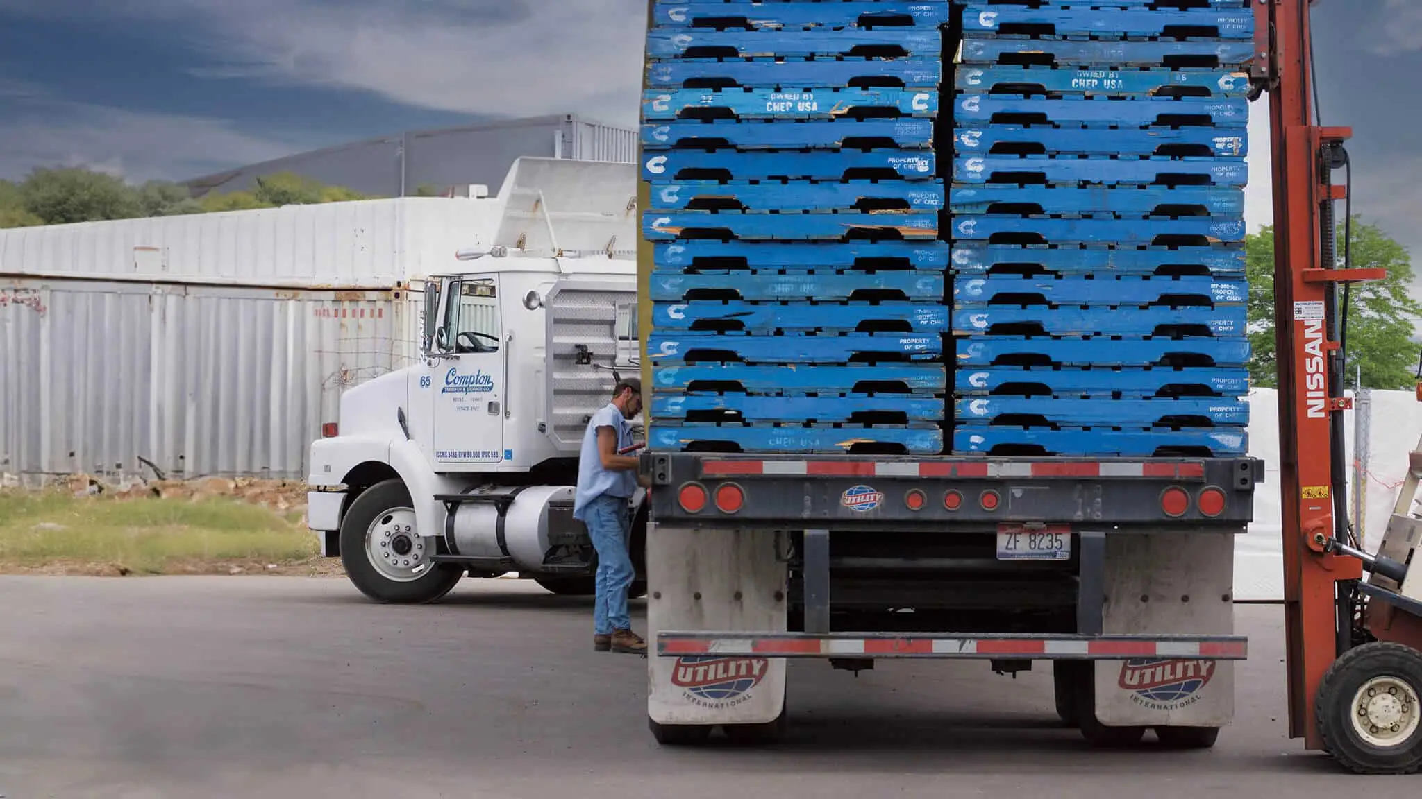 compton hero truck loaded with blue pallets